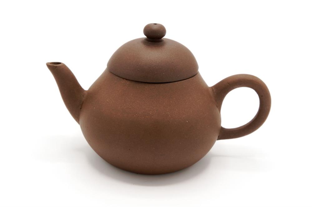 90's Yixing teapot that looks like an antique teapot. It makes horrible tea!